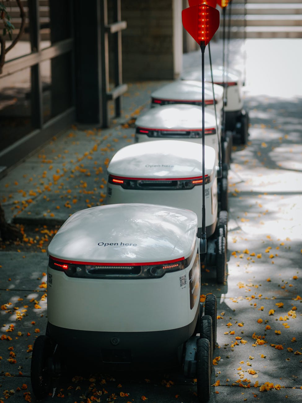 high angle shot of delivery robots